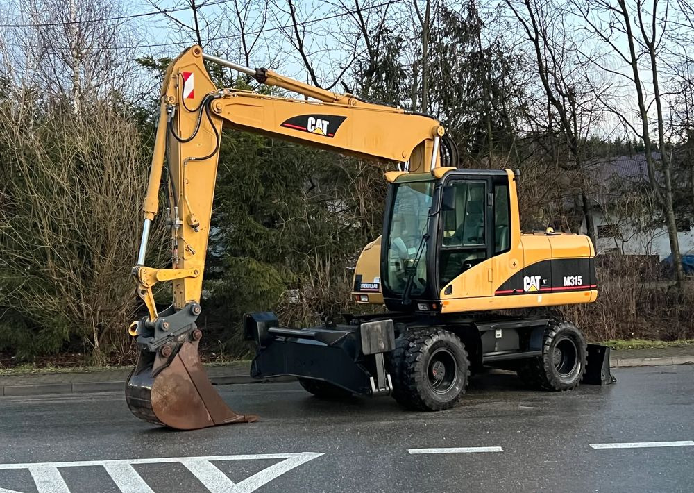 Caterpillar CAT M315C CATERPILLAR SPROWADZONY Bardzo Dobry Stan - 轮式挖掘机:图1 Caterpillar CAT M315C CATERPILLAR SPROWADZONY Bardzo Dobry Stan - 轮式挖掘机:图1