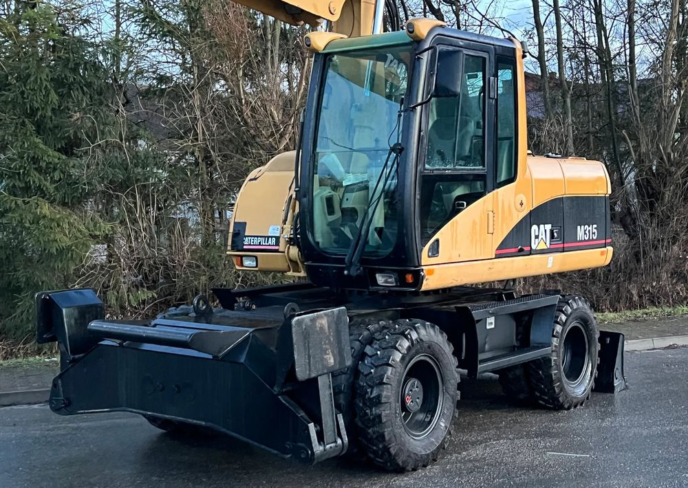 轮式挖掘机 Caterpillar CAT M315C CATERPILLAR SPROWADZONY Bardzo Dobry Stan:图16 轮式挖掘机 Caterpillar CAT M315C CATERPILLAR SPROWADZONY Bardzo Dobry Stan:图16