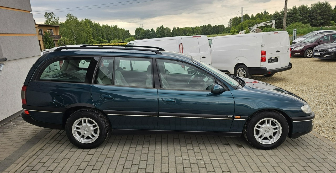 Opel Omega B 2,5 v6 *automat* napęd tył *welury* - 汽车:图5 Opel Omega B 2,5 v6 *automat* napęd tył *welury* - 汽车:图5