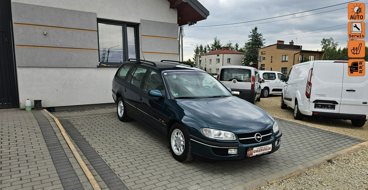 Opel Omega B 2,5 v6 *automat* napęd tył *welury* - 汽车:图1 Opel Omega B 2,5 v6 *automat* napęd tył *welury* - 汽车:图1
