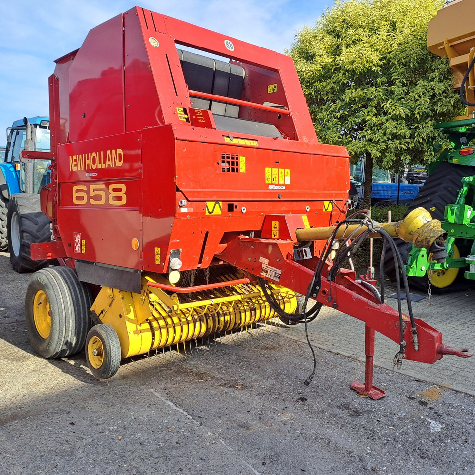 ROTOPRESSA NEW HOLLAND 658 - 圆形打包机:图2 ROTOPRESSA NEW HOLLAND 658 - 圆形打包机:图2
