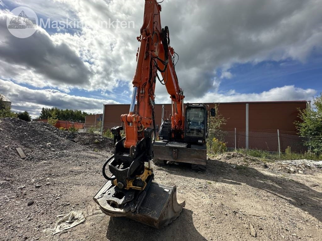 Hitachi ZX 140 W-5B - 轮式挖掘机:图2 Hitachi ZX 140 W-5B - 轮式挖掘机:图2
