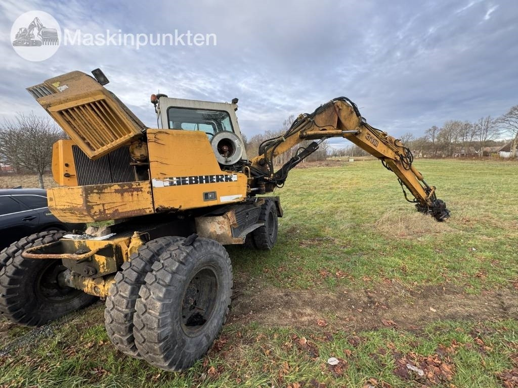 Liebherr A 310 B - 轮式挖掘机:图3 Liebherr A 310 B - 轮式挖掘机:图3