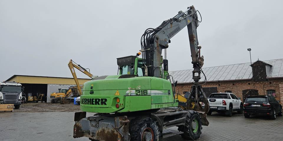 Koparka kołowa Liebherr A 316 Litronic chwytak podpory pług - 轮式挖掘机:图5 Koparka kołowa Liebherr A 316 Litronic chwytak podpory pług - 轮式挖掘机:图5