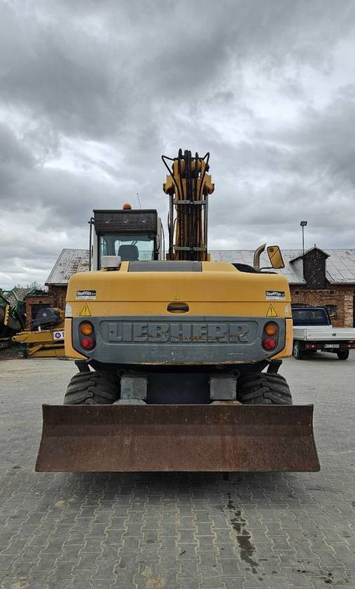 轮式挖掘机 Koparka kołowa Liebherr A314 Litronic 9350 h 4 łyżki kołówka:图7 轮式挖掘机 Koparka kołowa Liebherr A314 Litronic 9350 h 4 łyżki kołówka:图7