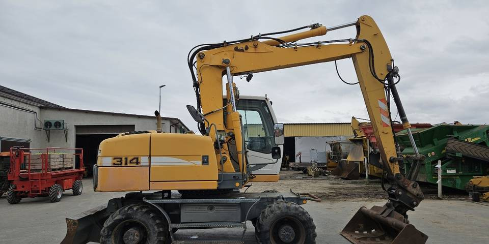 Koparka kołowa Liebherr A314 Litronic 9350 h+ 5 łyżek kołówka - 轮式挖掘机:图5 Koparka kołowa Liebherr A314 Litronic 9350 h+ 5 łyżek kołówka - 轮式挖掘机:图5