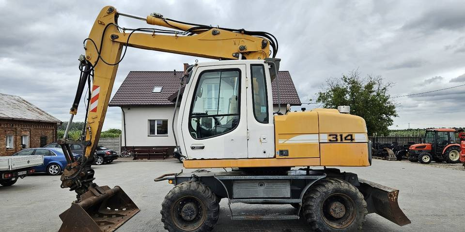 Koparka kołowa Liebherr A314 Litronic 9350 h+ 5 łyżek kołówka - 轮式挖掘机:图1 Koparka kołowa Liebherr A314 Litronic 9350 h+ 5 łyżek kołówka - 轮式挖掘机:图1