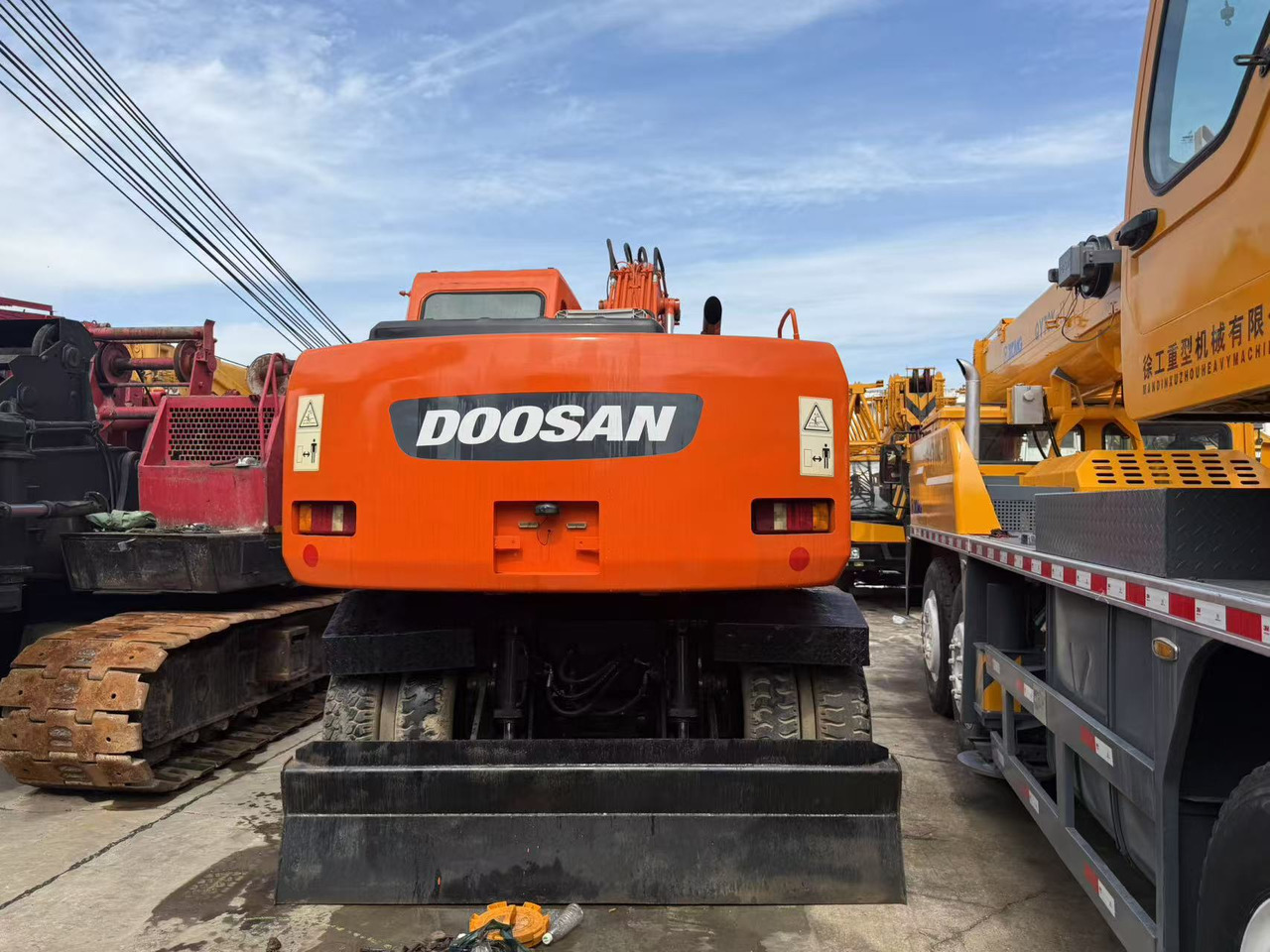 DOOSAN DH150W-7 - 轮式挖掘机:图2 DOOSAN DH150W-7 - 轮式挖掘机:图2