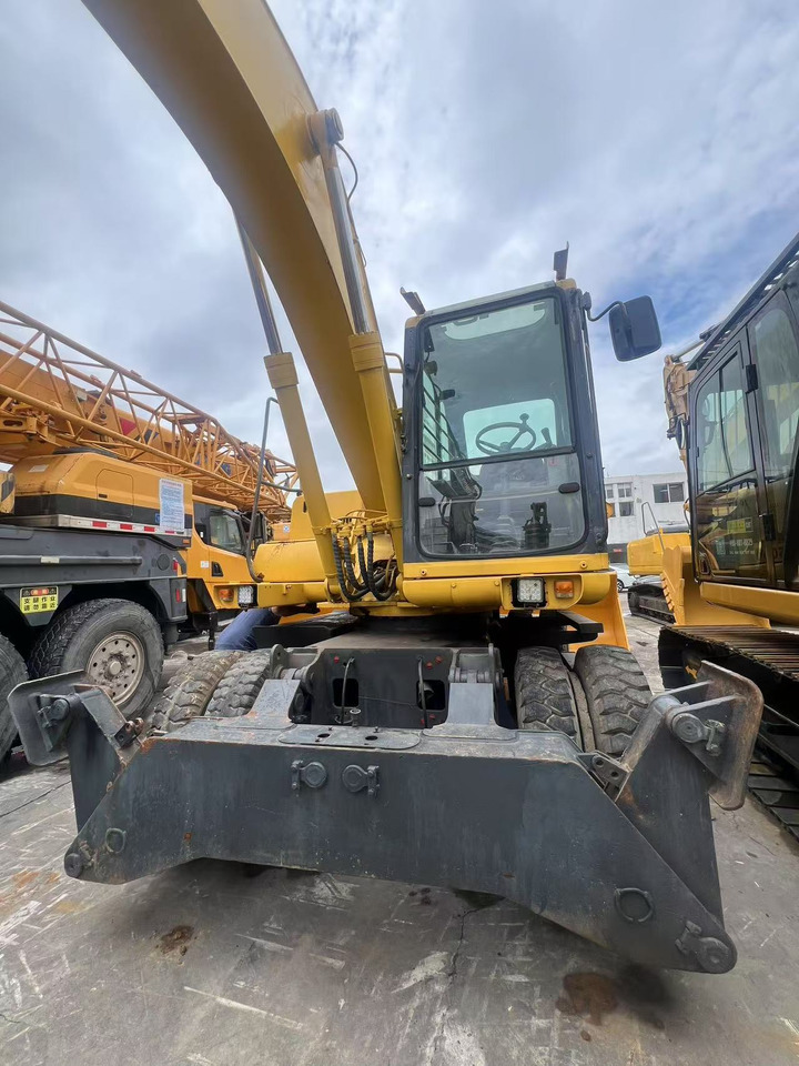 KOMATSU PW150 - 轮式挖掘机:图1 KOMATSU PW150 - 轮式挖掘机:图1