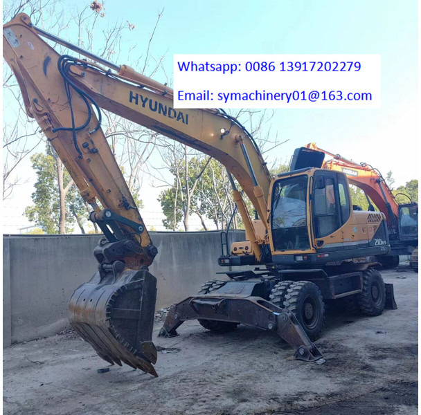 Hyundai R210W - 轮式挖掘机:图2 Hyundai R210W - 轮式挖掘机:图2