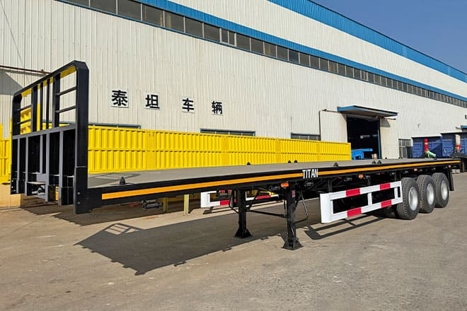 TITAN Tri Axle Flatbed Trailer for Sale in Jamaica - 栏板式/ 平板半拖车:图1 TITAN Tri Axle Flatbed Trailer for Sale in Jamaica - 栏板式/ 平板半拖车:图1