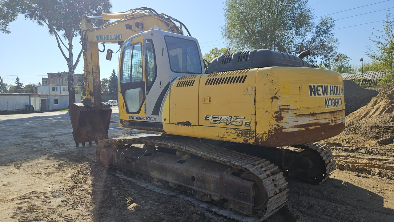 NEW HOLLAND E 245 B - 履带式挖掘机:图5 NEW HOLLAND E 245 B - 履带式挖掘机:图5