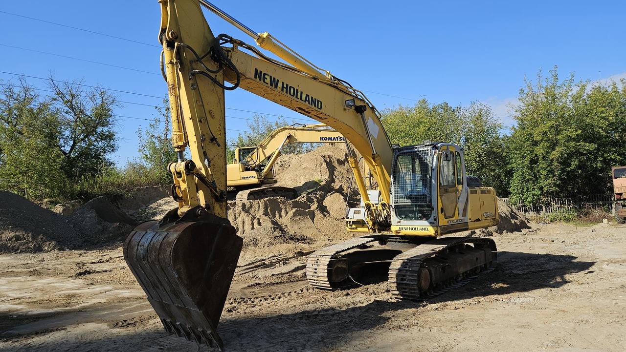 NEW HOLLAND E 245 B - 履带式挖掘机:图1 NEW HOLLAND E 245 B - 履带式挖掘机:图1