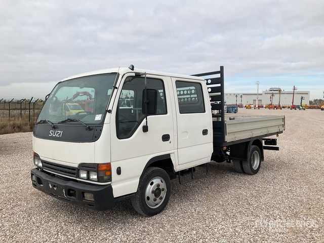2006 Isuzu NPR77 4x2 Crew Cab Flatbed Truck - 栏板式/ 平板卡车:图1 2006 Isuzu NPR77 4x2 Crew Cab Flatbed Truck - 栏板式/ 平板卡车:图1