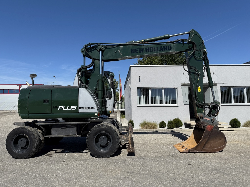 New Holland MH-Plus (111695) - 轮式挖掘机:图5 New Holland MH-Plus (111695) - 轮式挖掘机:图5