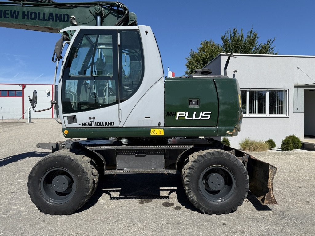 New Holland MH-Plus (111695) - 轮式挖掘机:图2 New Holland MH-Plus (111695) - 轮式挖掘机:图2