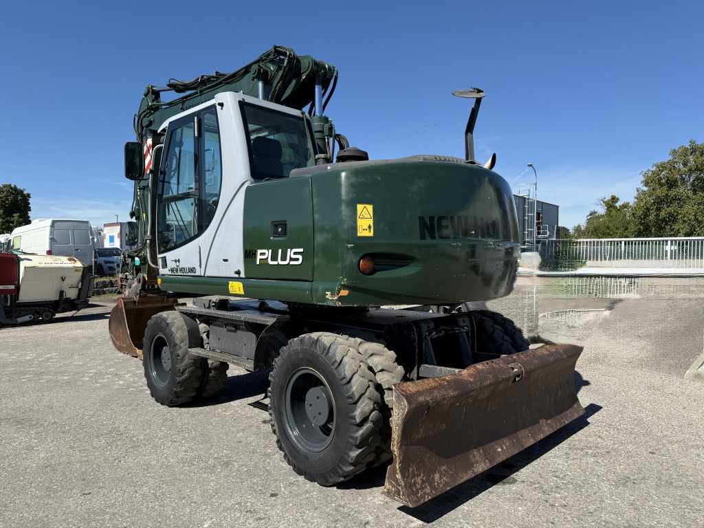 New Holland MH-Plus (111695) - 轮式挖掘机:图4 New Holland MH-Plus (111695) - 轮式挖掘机:图4