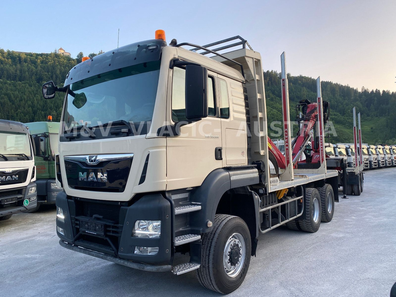 MAN 33.500 6X6 mit Kran PENZ 12Z - 木材运输车, 起重车:图1 MAN 33.500 6X6 mit Kran PENZ 12Z - 木材运输车, 起重车:图1