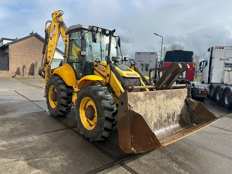 New Holland LB115B, CE, 240 MM MULTI PURPOSE LOADER BUCKET, 800 MM BACHOE DIGGING BUCKET, FLIP OVER FORKS, AIR CONDITIONER - 反铲装载机:图5 New Holland LB115B, CE, 240 MM MULTI PURPOSE LOADER BUCKET, 800 MM BACHOE DIGGING BUCKET, FLIP OVER FORKS, AIR CONDITIONER - 反铲装载机:图5