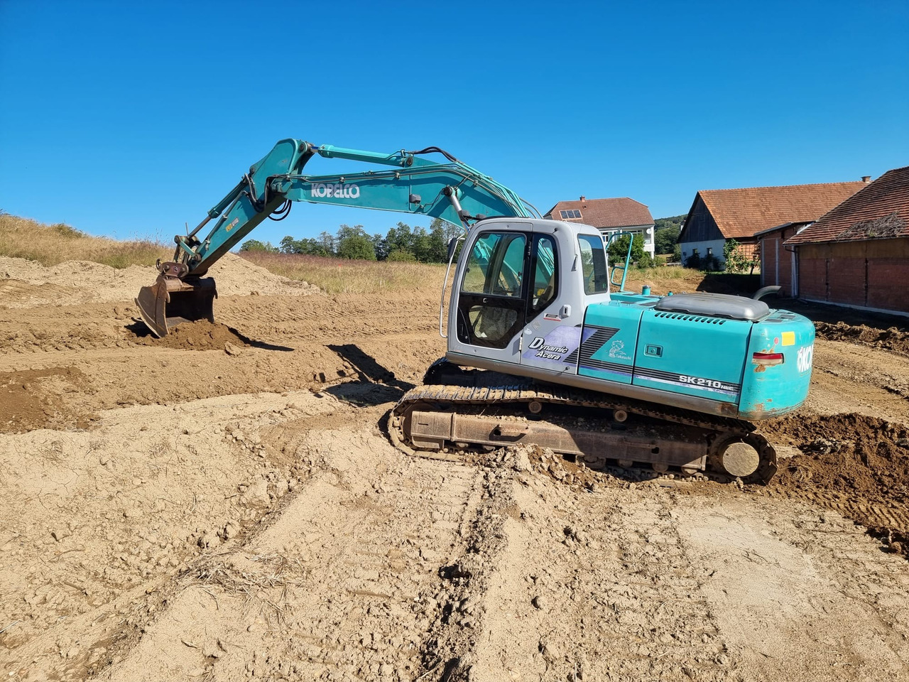 KOBELCO SK 210 NLC-6E - 履带式挖掘机:图1 KOBELCO SK 210 NLC-6E - 履带式挖掘机:图1