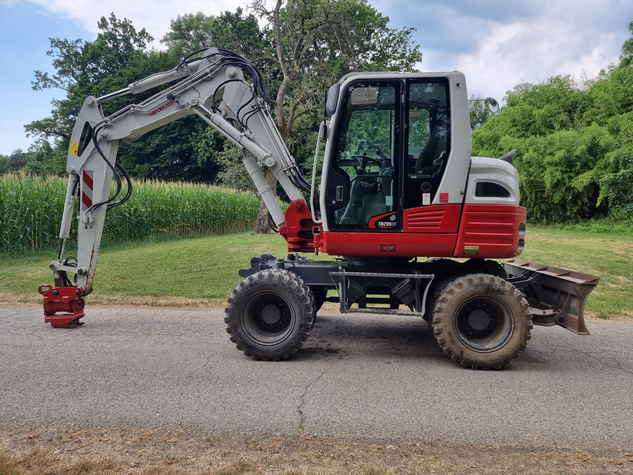 Takeuchi TB 295 W - 轮式挖掘机:图1 Takeuchi TB 295 W - 轮式挖掘机:图1