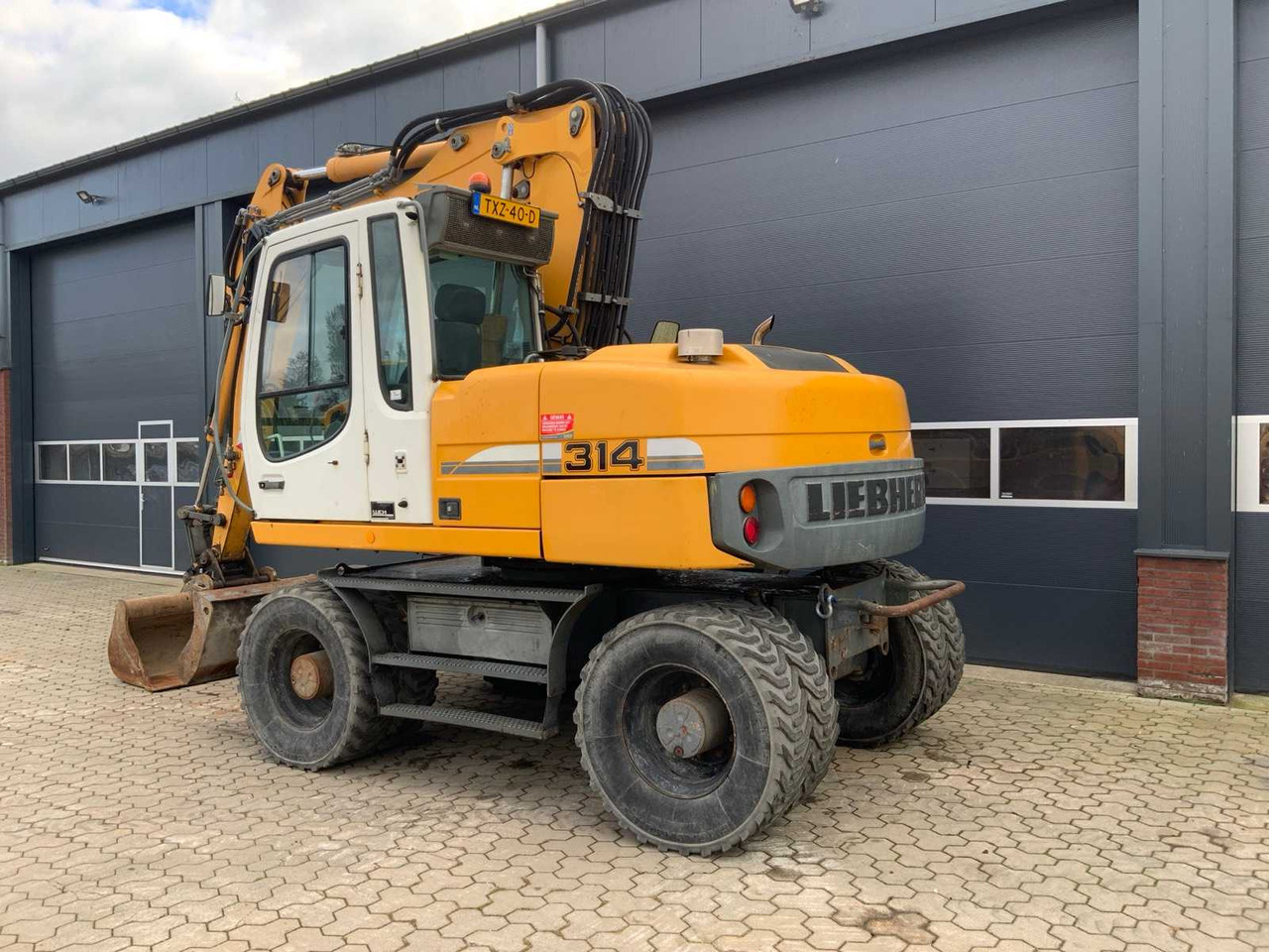 Liebherr A314 Litronic - 轮式挖掘机:图5 Liebherr A314 Litronic - 轮式挖掘机:图5