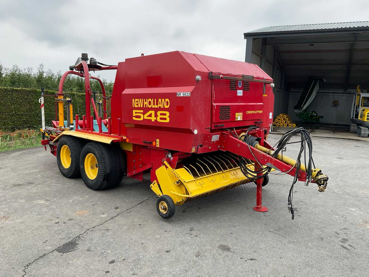 New Holland 548 - 圆形打包机, 包膜机:图1 New Holland 548 - 圆形打包机, 包膜机:图1