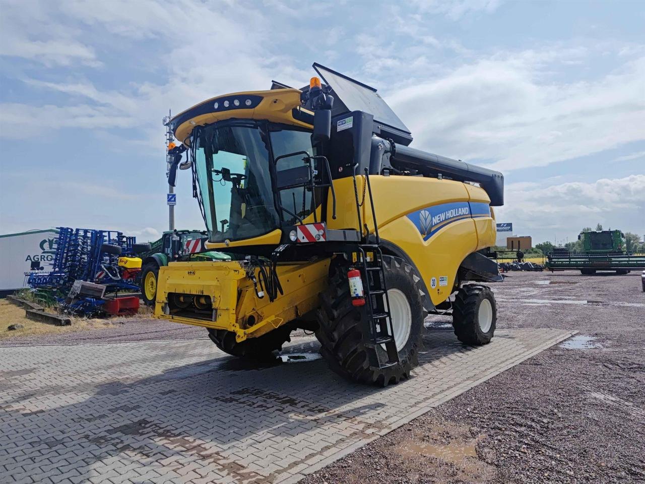 New Holland CX 5.80 - 联合收割机:图1 New Holland CX 5.80 - 联合收割机:图1