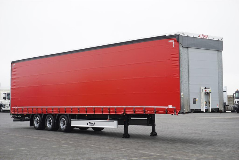 Fliegl FIRANKA / MEGA / MULTI LOCK / XL / OŚ PODNOSZONA - 侧帘半拖车:图1 Fliegl FIRANKA / MEGA / MULTI LOCK / XL / OŚ PODNOSZONA - 侧帘半拖车:图1