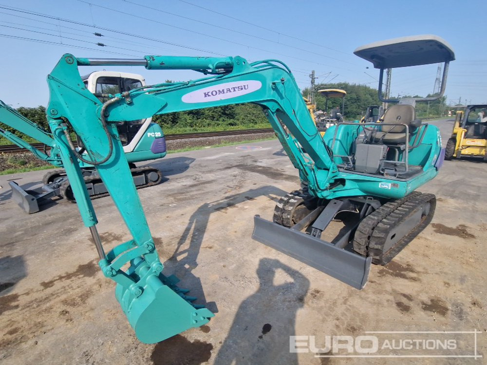 Komatsu PC15-3 - 小型挖掘机:图1 Komatsu PC15-3 - 小型挖掘机:图1