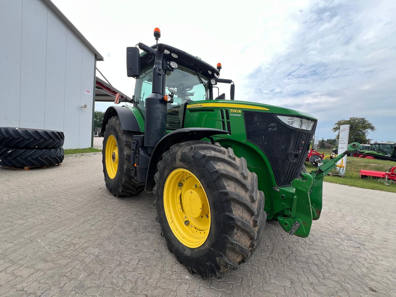 John Deere 7310 R - 拖拉机:图1 John Deere 7310 R - 拖拉机:图1