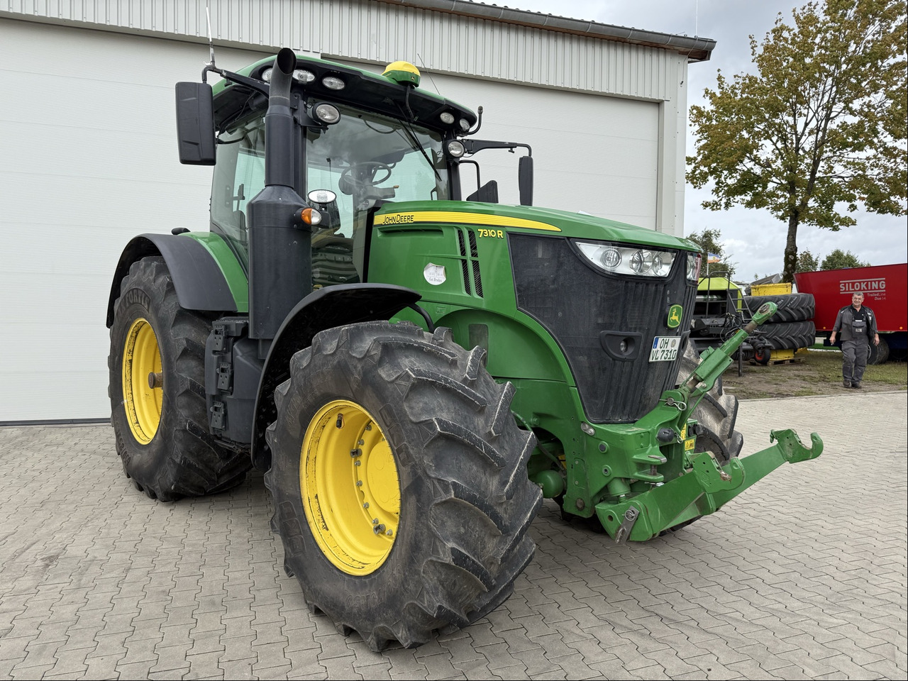 John Deere 7310R E23 - 拖拉机:图1 John Deere 7310R E23 - 拖拉机:图1