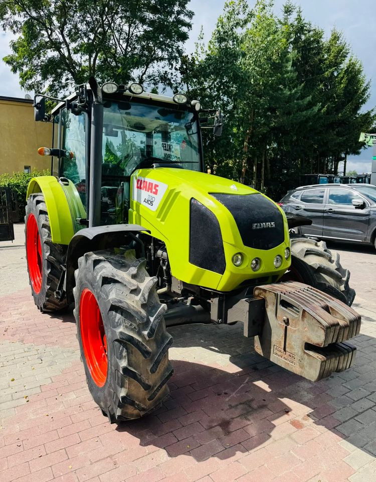 Claas Axos 330 - 拖拉机:图1 Claas Axos 330 - 拖拉机:图1