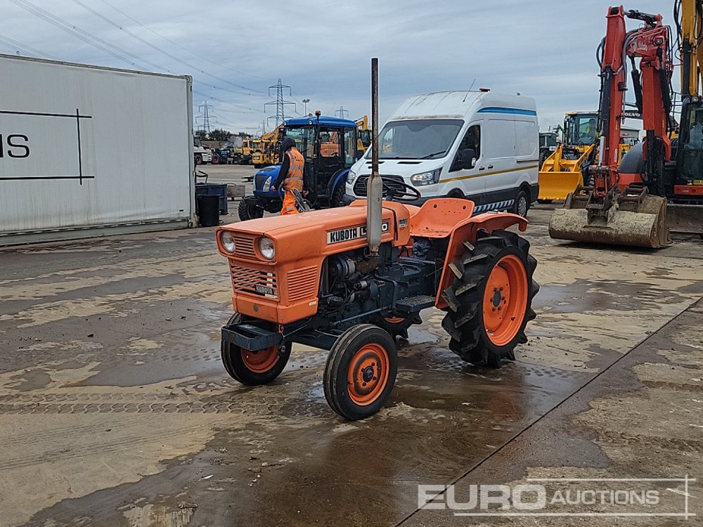 Kubota L1500 - 紧凑型拖拉机:图1 Kubota L1500 - 紧凑型拖拉机:图1