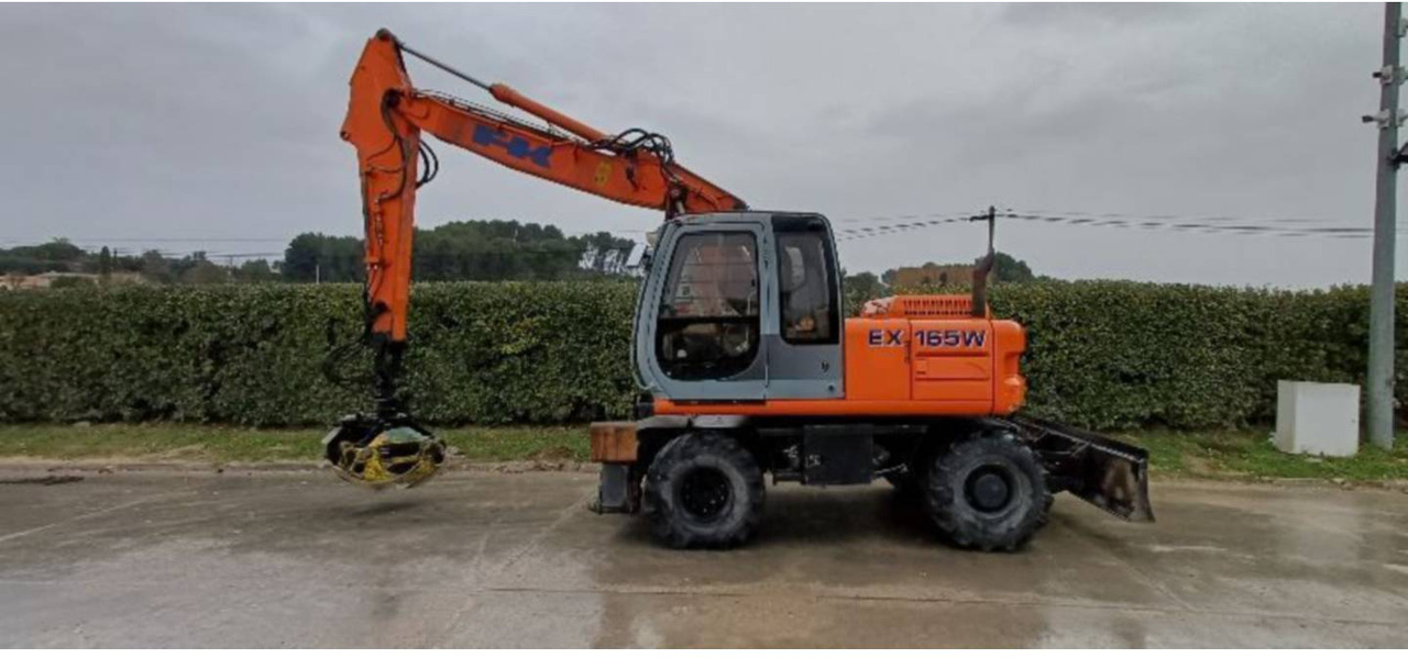 FIAT ALLIS / NEW HOLLAND EX165W - 轮式挖掘机:图1 FIAT ALLIS / NEW HOLLAND EX165W - 轮式挖掘机:图1