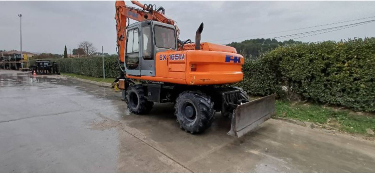 FIAT ALLIS / NEW HOLLAND EX165W - 轮式挖掘机:图3 FIAT ALLIS / NEW HOLLAND EX165W - 轮式挖掘机:图3