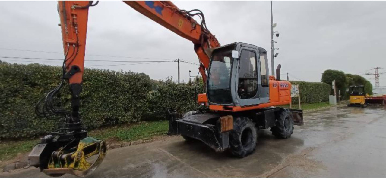 FIAT ALLIS / NEW HOLLAND EX165W - 轮式挖掘机:图2 FIAT ALLIS / NEW HOLLAND EX165W - 轮式挖掘机:图2