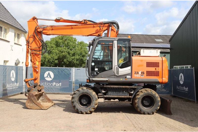Hitachi ZX140W-3 - 轮式挖掘机:图2 Hitachi ZX140W-3 - 轮式挖掘机:图2