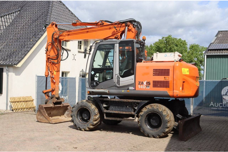 Hitachi ZX140W-3 - 轮式挖掘机:图3 Hitachi ZX140W-3 - 轮式挖掘机:图3