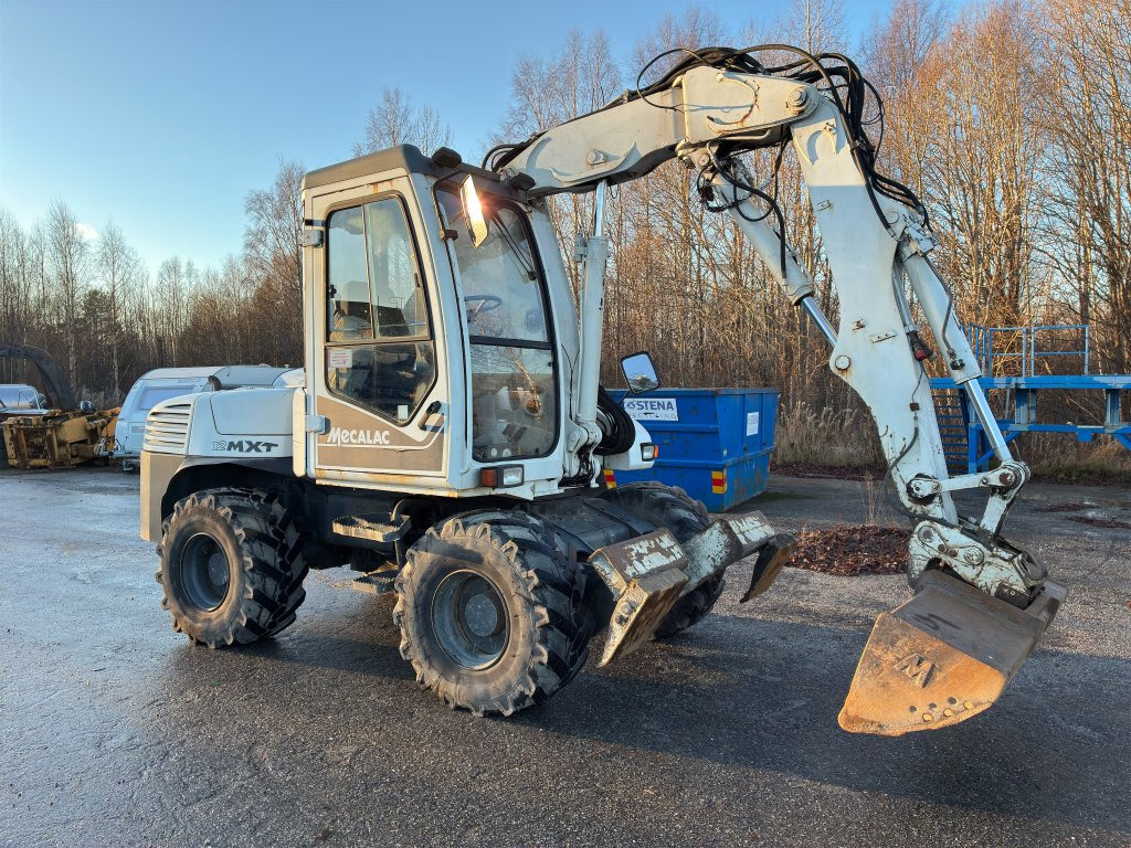 Mecalac 12MXT - 轮式挖掘机:图4 Mecalac 12MXT - 轮式挖掘机:图4