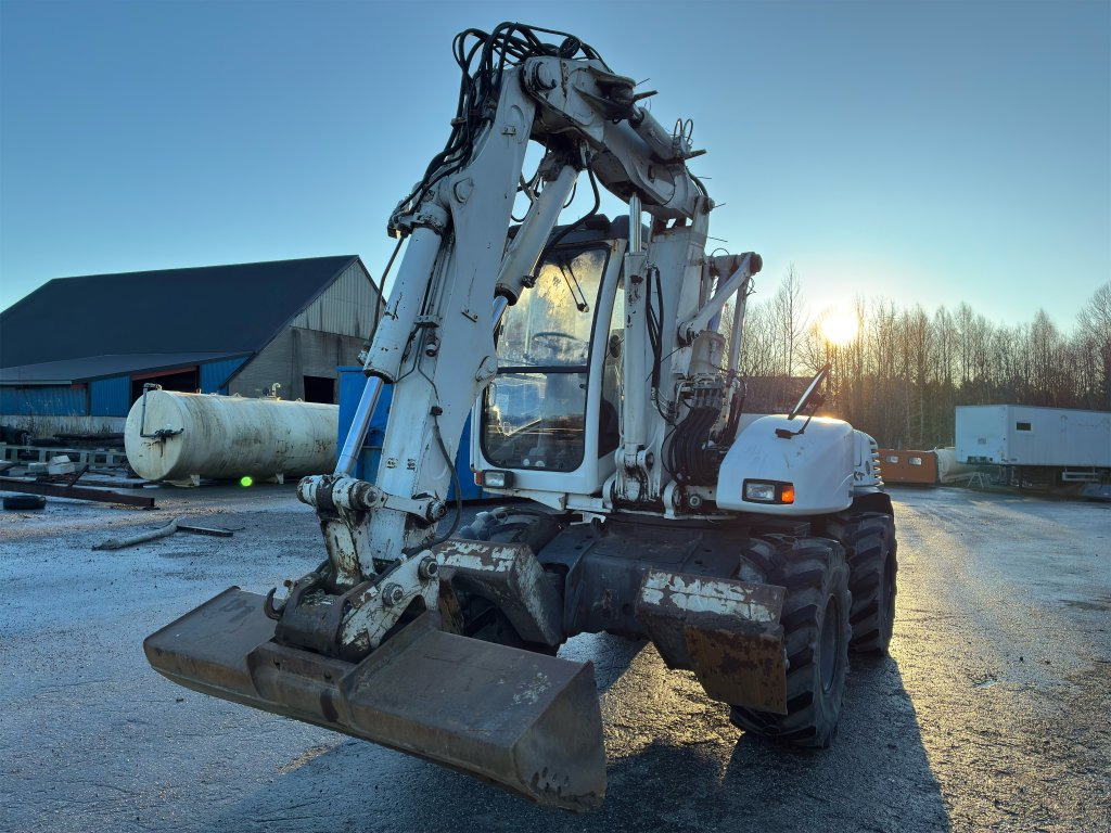 Mecalac 12MXT - 轮式挖掘机:图2 Mecalac 12MXT - 轮式挖掘机:图2